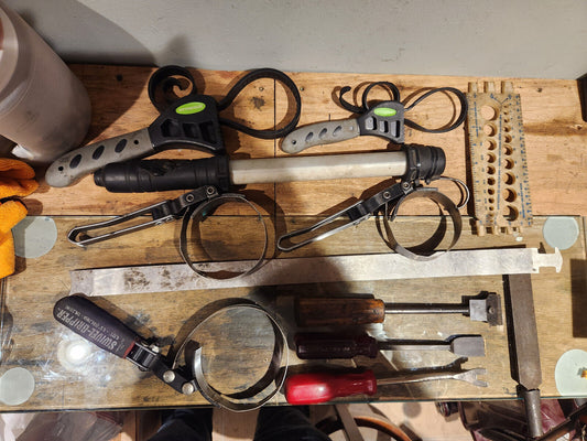 Automotive Tool Lot with Oil Filter Wrenches, Scrappers, and Rechargeable Light